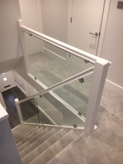 Square-edged newel post and handrail detail